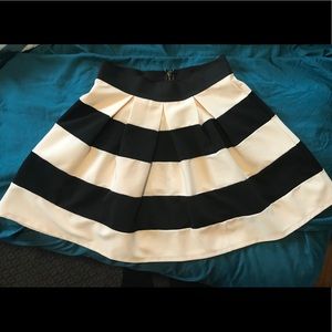 Thick cream and black skirt